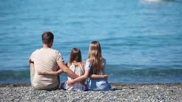 Happy beautiful family on a tropical beach vacation video