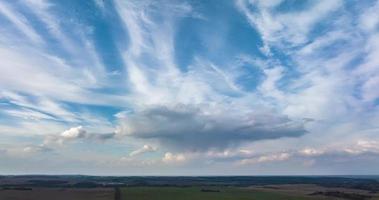 timelapse of blue sky background with many layers striped clouds video