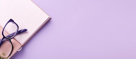 A pair of glasses sitting on top of a book created with technology photo