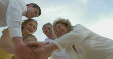 Family Members Putting Hands Together video