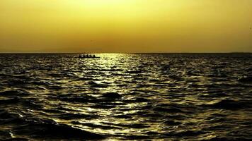 Boat is Passing in Sea in Sunset video