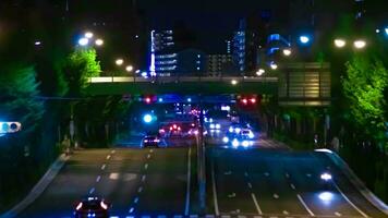 A night timelapse of traffic jam at the downtown street in Takashimadaira Tokyo telephoto shot video