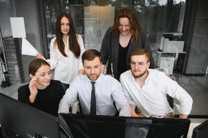 Group of young people in business meeting photo