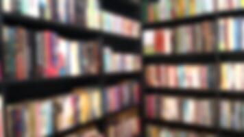 Abstract blurred public library with bookshelves interior space. Defocused effect for education concepts background. photo