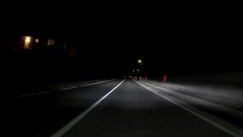 driving a car on countryside road at night with adaptive matrix headlights video