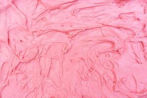 Strawberry ice cream texture. photo