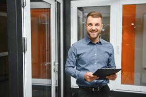 Sales manager in a window shop. The concept of window sales. photo