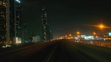 UAE, Dubai - UAE 01 April 2024 Dubai Metro Speeding Through the City at Night, The Dubai Metro zips through the illuminated urban landscape, offering a modern transit experience in the heart of the video