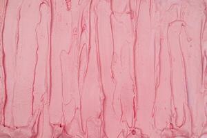 Strawberry ice cream texture. Top view. Delicious cool treat. photo