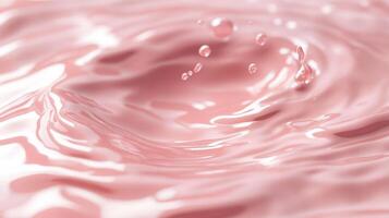 Pink Liquid with Droplets Creating Ripples photo