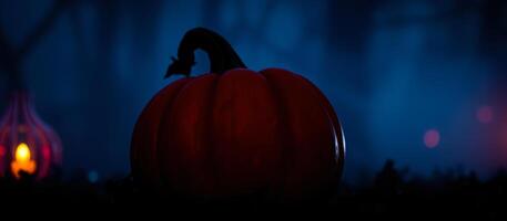 red pumpkin glowing the dark photo