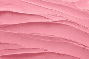 Closeup pink creamy texture background photo