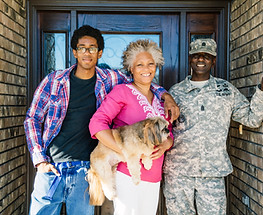 Military family outside the front door