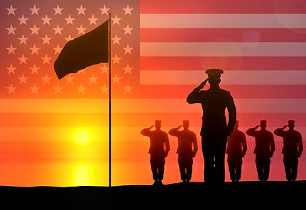 Image of troops saluting with American flag backdrop