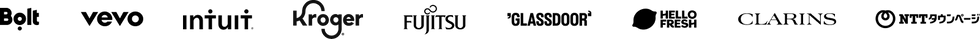 Logos of brands such as Clarins, Glassdoor, and Hello Fresh, which use Wix Studio for enterprise, are displayed in a horizontal strip.