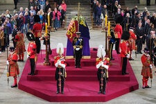 King Charles III and his siblings standing vigil beside the coffin of their mother, Queen Elizabeth II, as it lies in state on the catafalque in Westminster Hall on Friday.