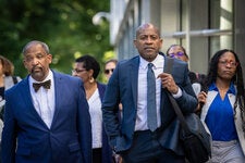 Carlos Watson, center, leaving federal court in Brooklyn after testifying early this month.