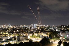 Israel’s Iron Dome missile defense system intercepted rockets after Iran fired a salvo of ballistic missiles on Tuesday.