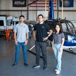 Hector Xu, center, founder of Rotor Technologies, with two fellow executives, Kris Frey, left, and Yiou He. The company converts helicopters to remotely piloted drones, an idea Mr. Xu had during the pandemic lockdowns.