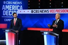 Gov. Tim Walz of Minnesota and Senator JD Vance of Ohio walked onto the stage in nearly identical, ho-hum dark suits and starched white shirts.