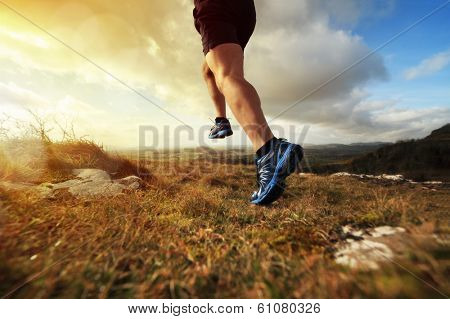 Outdoor cross-country running in early sunrise concept for exercising, fitness and healthy lifestyle