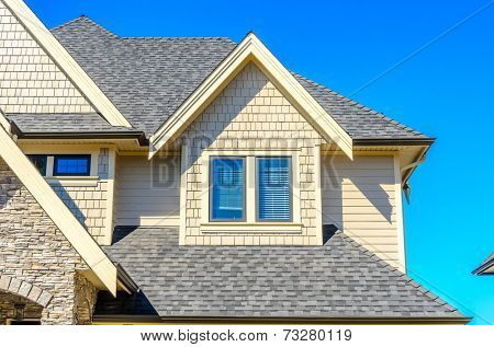 the roof of the house with nice window