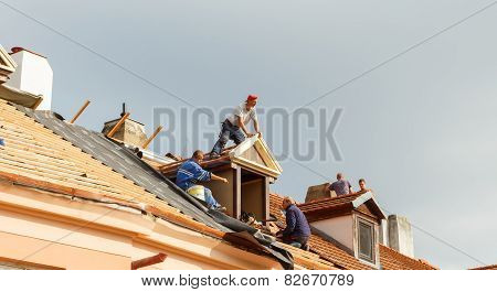 Roofers On The Roof.