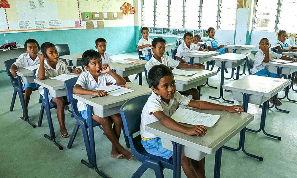 School kids in Nui island, Tuvalu. After cyclone Pam the primary school in Nui island was flooded due to a wave surge. Photo: Silke von Brockhausen/UNDP