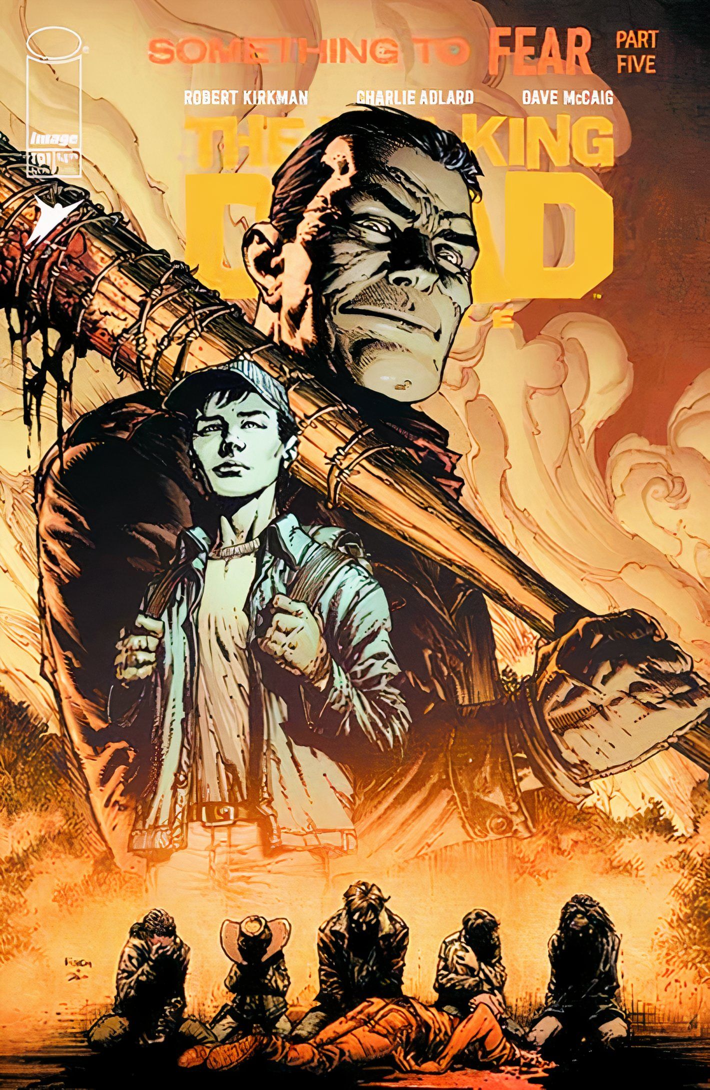 Capa de quadrinhos: Negan pairando sobre Glenn, enquanto os sobreviventes se ajoelham à sua mercê