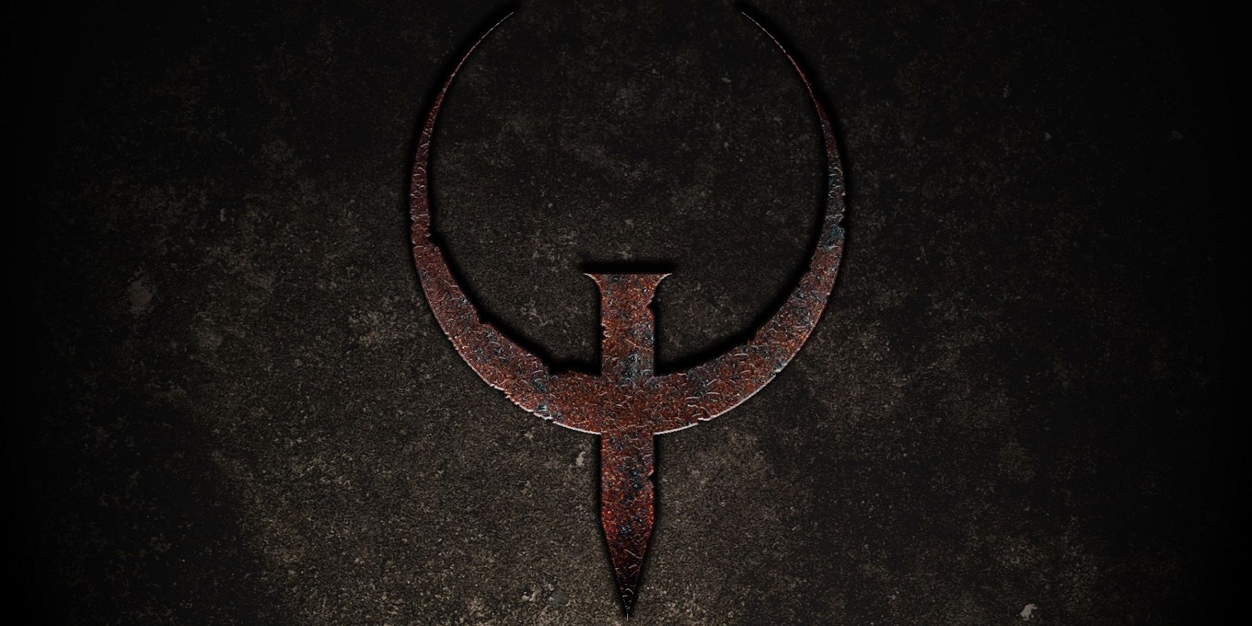 Logotipo do videogame Quake FPS na arte da caixa.