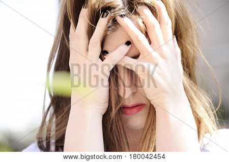 Depression. Depressed woman cover her face with her hands. Loneliness. Sadness. Sad woman.Depression concept.