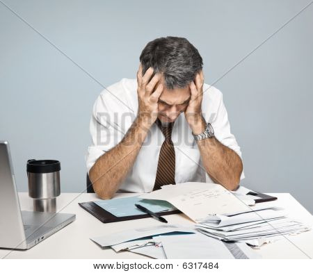 Stressed Man Worries About Economy, Paying Bills, Retirement