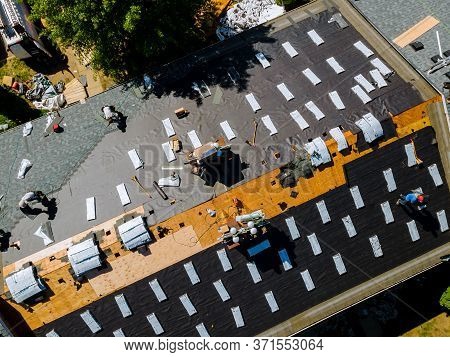 Removal Of Old Roof And Replacement Roofs With New Roof Shingle Being Applied Home Roof Construction