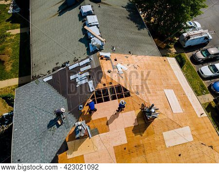 Removal Of Old Roof And Replacement Roofs With New Roof Shingle Being Applied Home Roof Construction