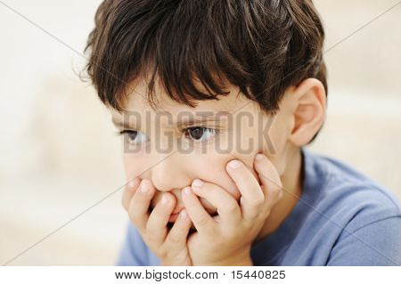 Autism, kid looking far away without interesting