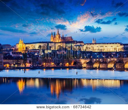 Travel Prague Europe concept background - view of Charles Bridge and Prague Castle in twilight. Prague, Czech Republic