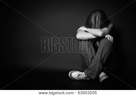 Woman In Depression And Despair Crying On Black Dark