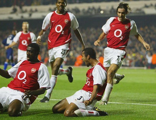 Ashley Cole celebrates scoring the winning goal