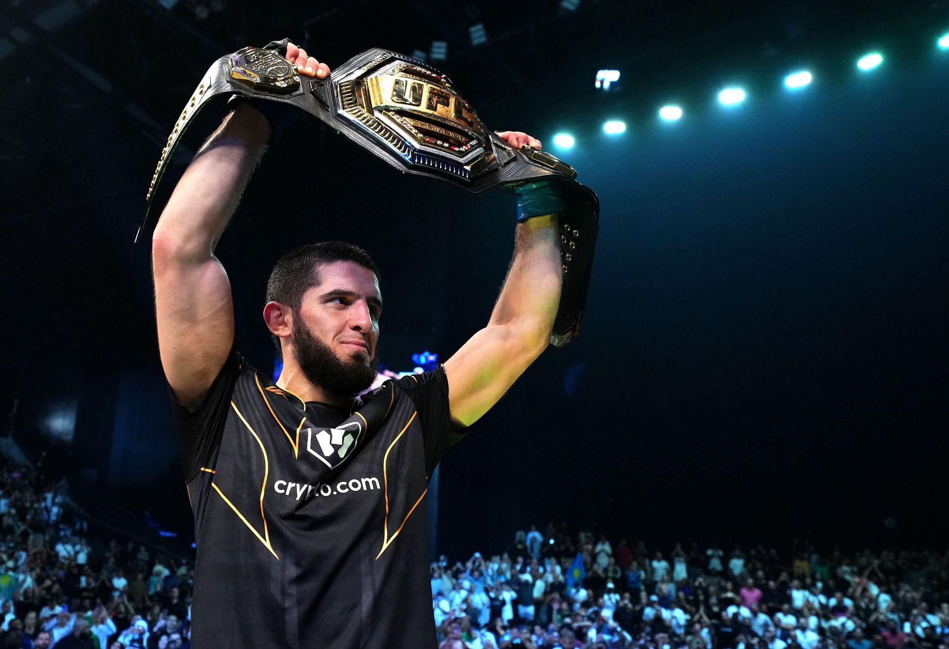 slam Makhachev with his lightweight belt at UFC 280 (Photo courtesy: UFC Twitter: @ufc)