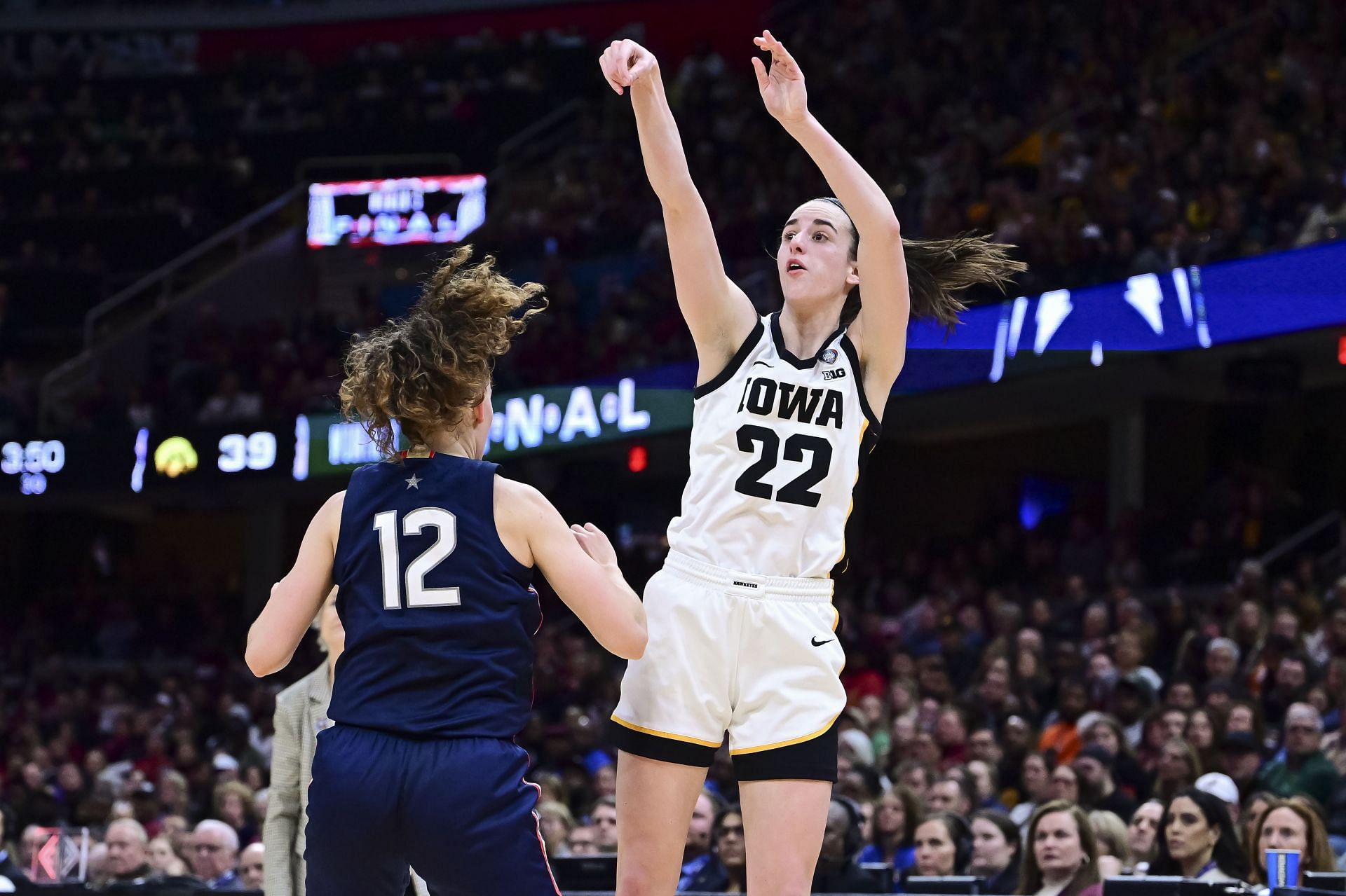 Caitlin Clark of the Iowa Hawkeyes shoots against the UConn Huskies during an NCAA Final Four semifinal game at Rocket Mortgage Fieldhouse. (Photo by Ben Solomon/NCAA Photos via Getty Images) - Source: Getty