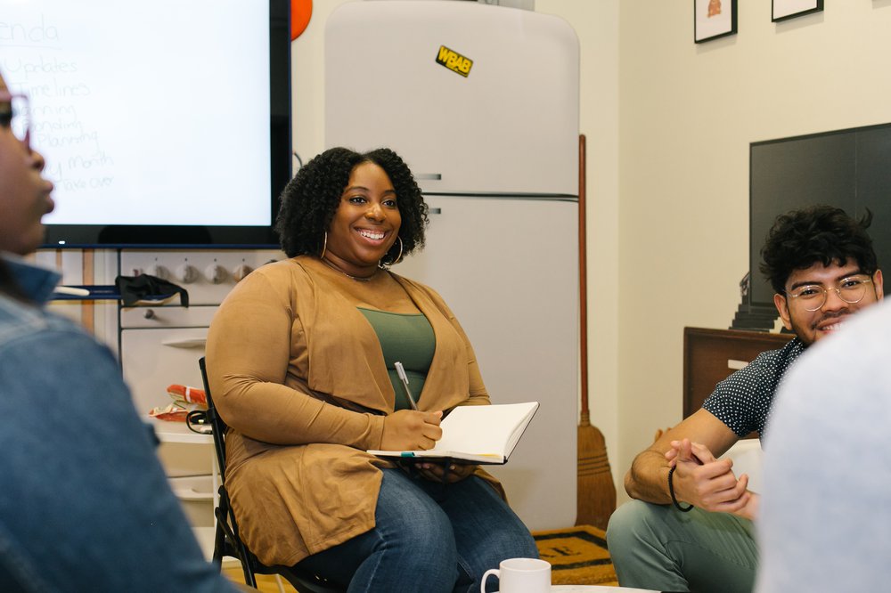 Woman leading group discussion