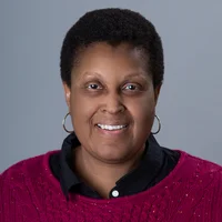 Image shows a headshot of Sonja Ebron.