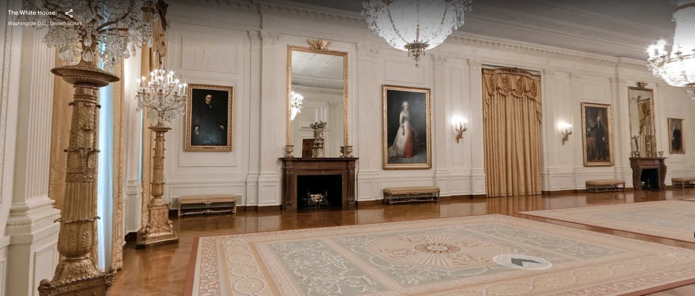 a larger stately room two fireplaces and multiple paintings, including Gilbert Stuart's 1797 portrait of President George Washington and John Singer Sargent's 1903 portrait of President Theodore Roosevelt.
