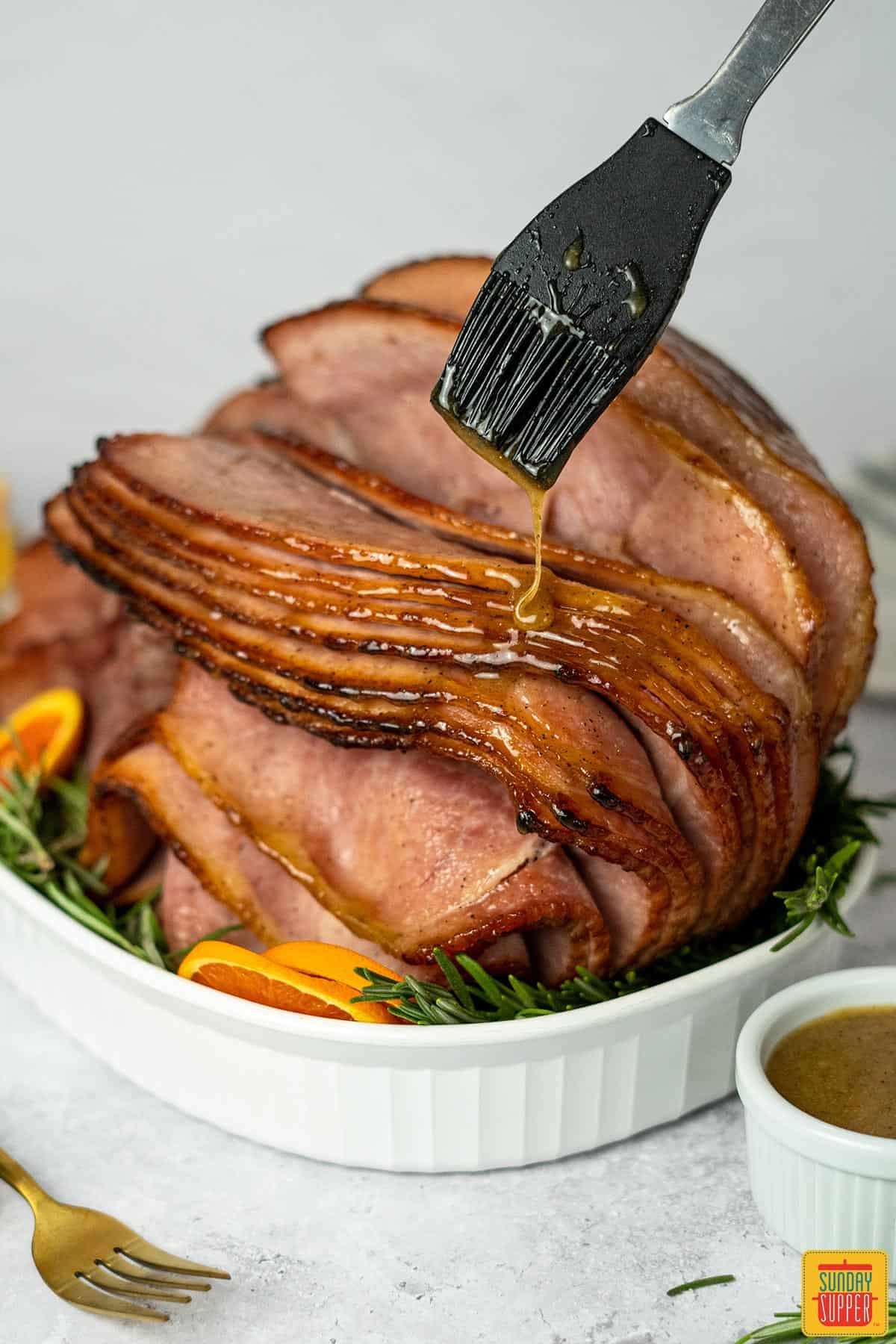 glaze dripping on honey glazed ham