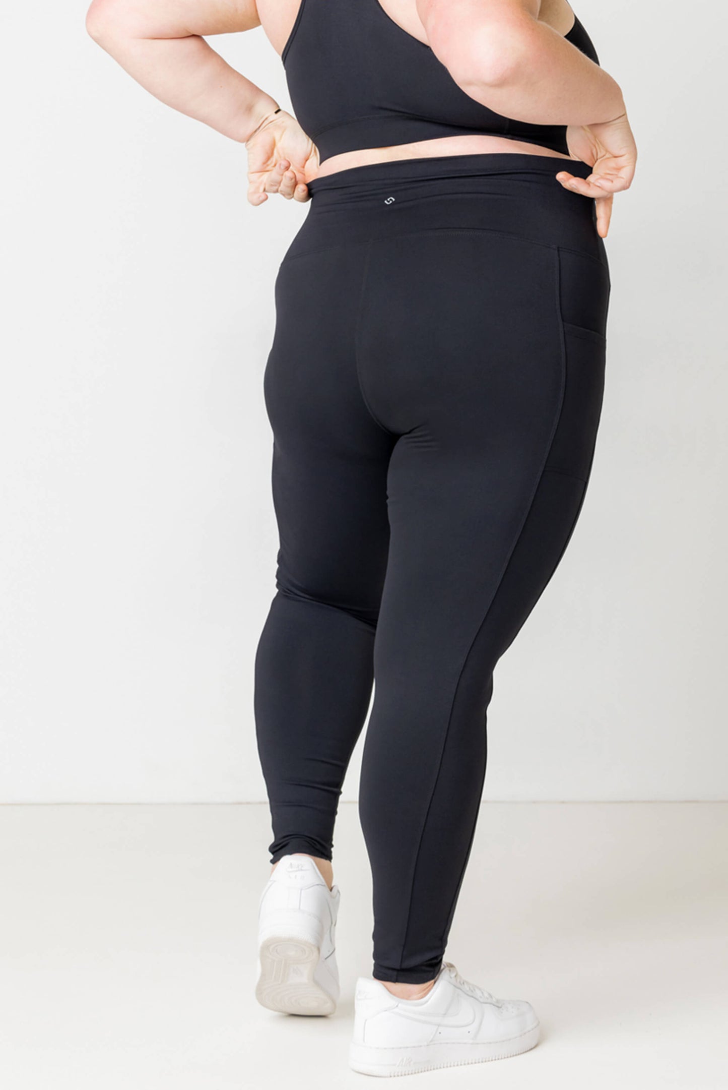 Back view of black Superfit Hero plus size leggings