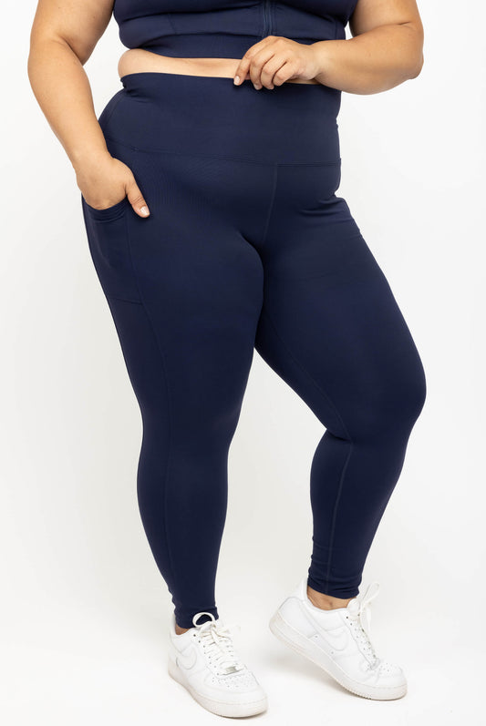 Cropped front view of Superfit Hero navy plus size 7/8 leggings with pockets size 2X