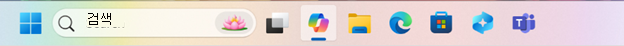 Copilot 아이콘이 선택된 Windows 작업 표시줄의 스크린샷.
