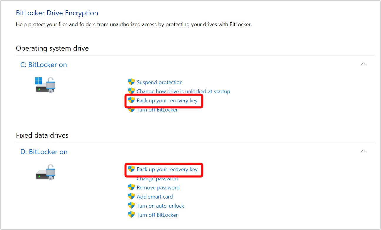 Captura de ecrã do Painel de Controlo a mostrar a opção para fazer uma cópia de segurança da chave de recuperação BitLocker para a unidade do SO e uma unidade de dados.