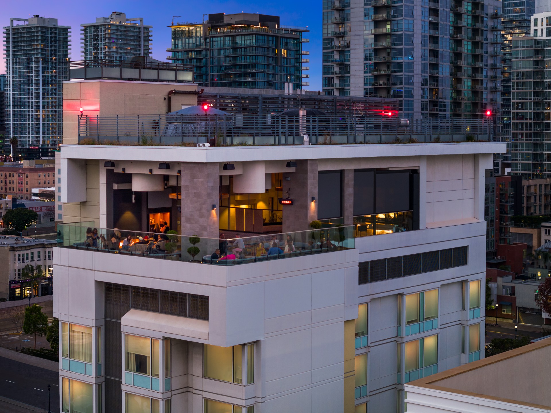 a building with a balcony and people on it