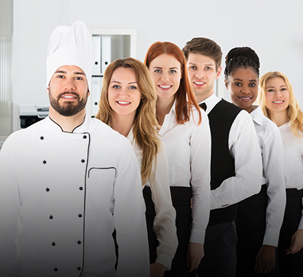 group of hotel employees posing